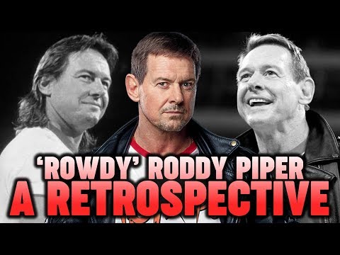 Video: Rowdy Roddy Piper Neto vrednost: Wiki, poročen, družina, poroka, plača, bratje in sestre