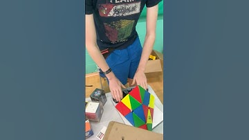 Daniel tries to solve massive piraminx in under 20 seconds.