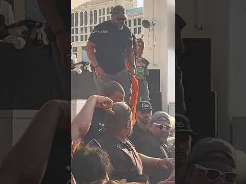 Cardi B sends mic flying towards crowd after splashed with drink