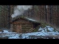 Dugout living, Primitive shelter in the winter forest