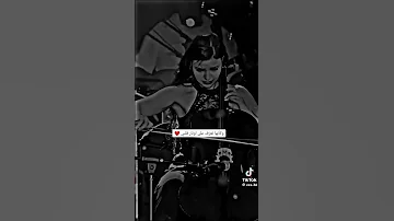 وكأنها تعزف على اوتار قلبها 