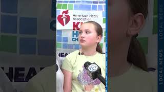 Fourth grader receives hero award after helping save dad's life