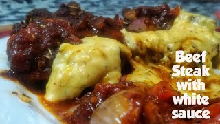Beef steak with white sauce -