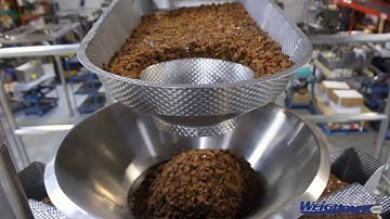 Swifty Bagger premade pouch machine for filling bacon bits into stand up bags