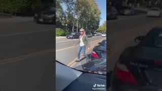 Karen brake checks and stops traffic because she got honked at