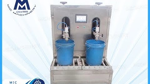 20l weighing filling machine: One Minute To Show You How Machine Fill oil into barrel automatically.