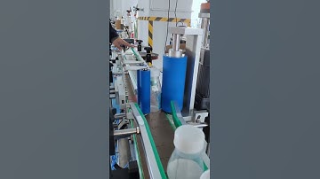 Automatic milk bottle labeling machine bottle label testing video