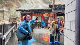 Lots of steps, Snow, Buddhist Temple and up into the clouds at Mount Hua near Xian China