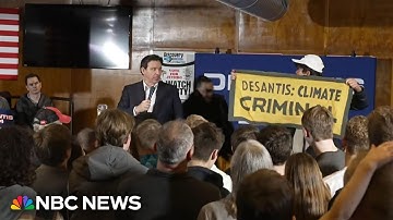 Climate protester at DeSantis event tackled by security after jumping on stage