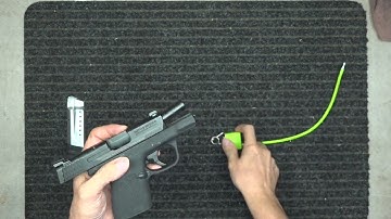 How to use the cable lock on a handgun.