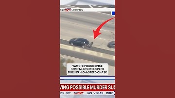 Police use a spike strip during a police chase of a possible murder suspect