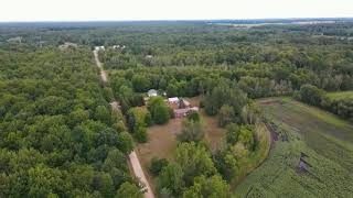 Ravenna country farm house for sale with a garage and pole barn.