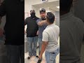 Ald. Jessie Fuentes, 26th, is handcuffed by federal agents inside Humboldt Park Health