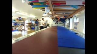 Cutting the panels for Kensa's mainsail at Collins Sailmakers