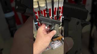 This is a good looking KIMBER Micro 9mm 3.15″ 7+1 w/ Crimson Trace LaserGrips (Red) – Woodland Green