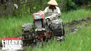 2 wheel hand Tractor Quick Kubota Plowing the rice field