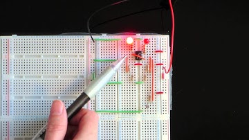 Two LEDs that switch on and off in response to a photoresistor