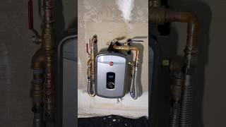 Installing a Rheem 2.54 GPM tankless water heater with whatever I got on the truck
