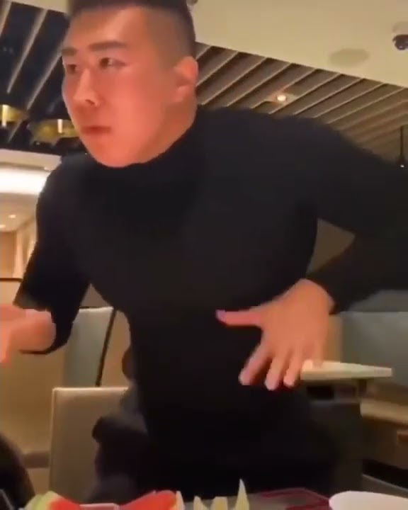 chinese man gets angry and then dances