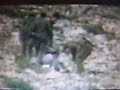 Israeli soldiers attacking Palestinians