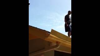 Kid Jumps Off Roof Into Pool