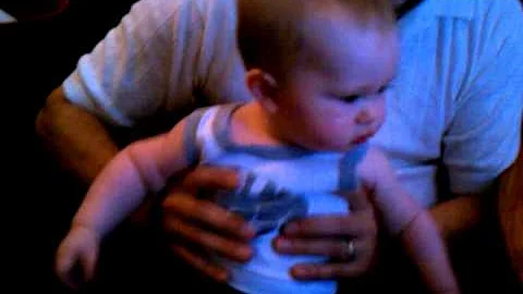 Baby bouncing and laughing