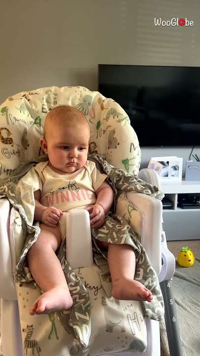 Baby smiles hearing the voice of Ms. Rachel