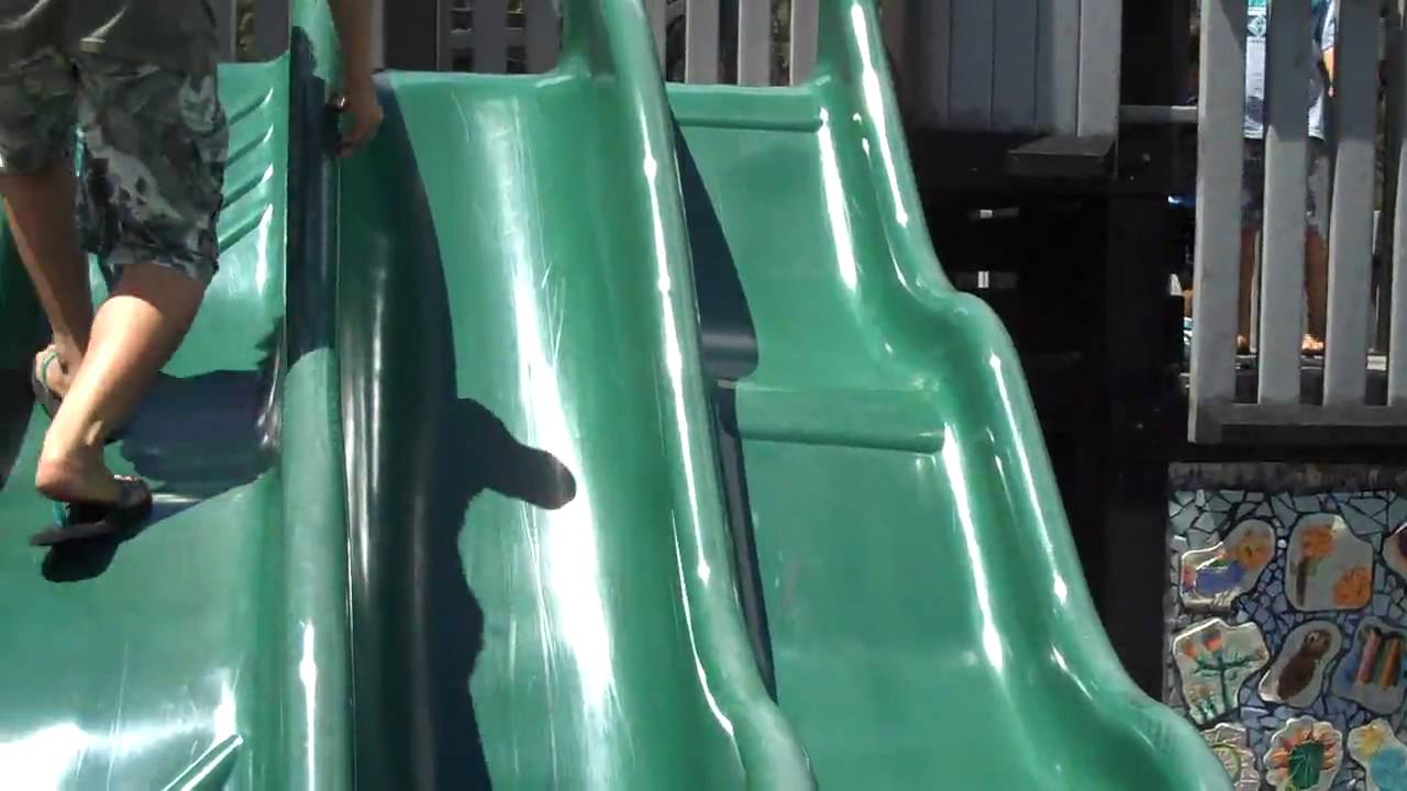Riding the slides at Giggle Hill.