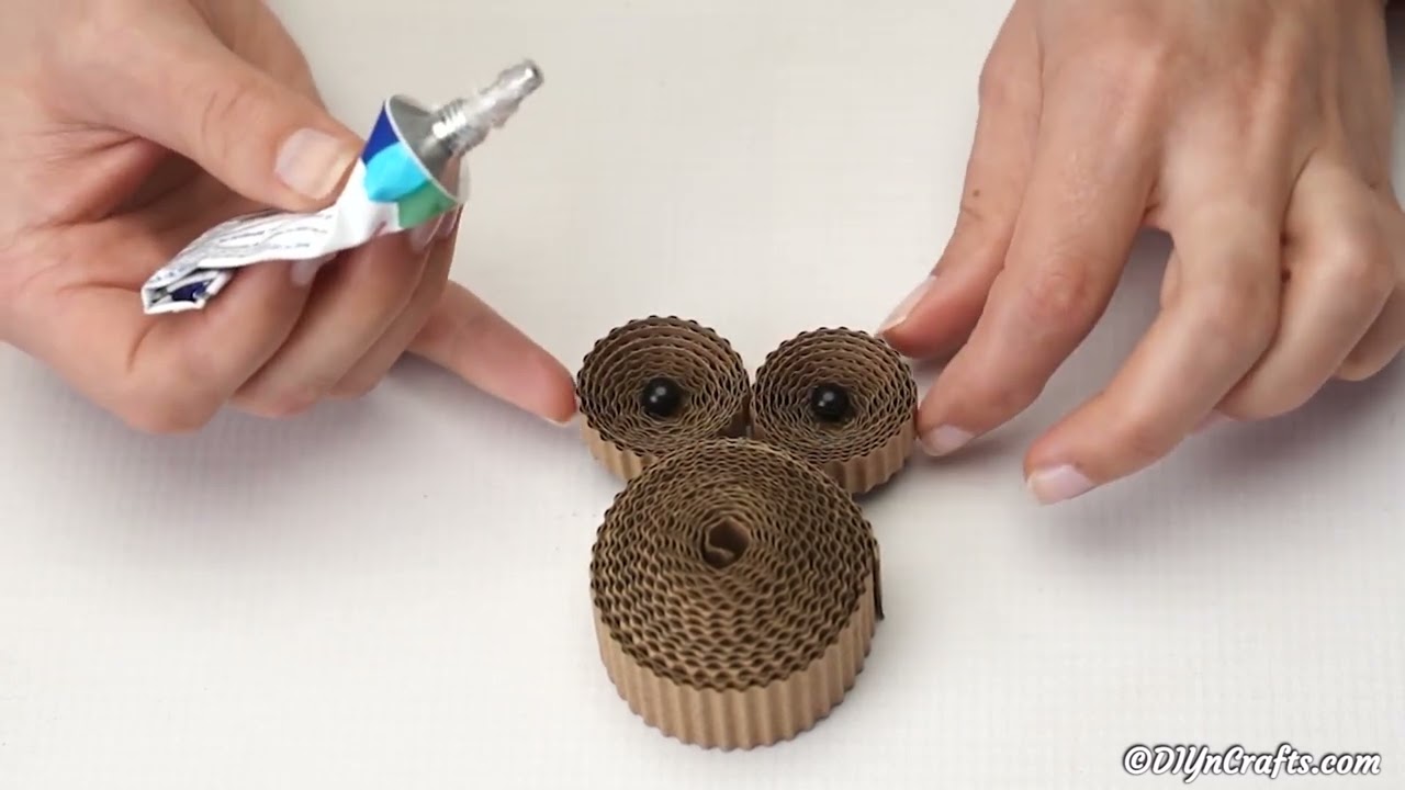 Create this adorable owl from cardboard only! Easy video tutorial.