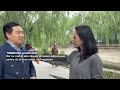 Ana Maria Păcuraru, față în față cu renumitul jurnalist chinez Yingshi Gao.