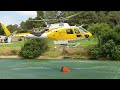 Extreme Close Up of Helicopter getting water at Golf Pond