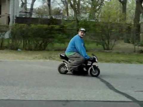 Image result for man on a mini bike