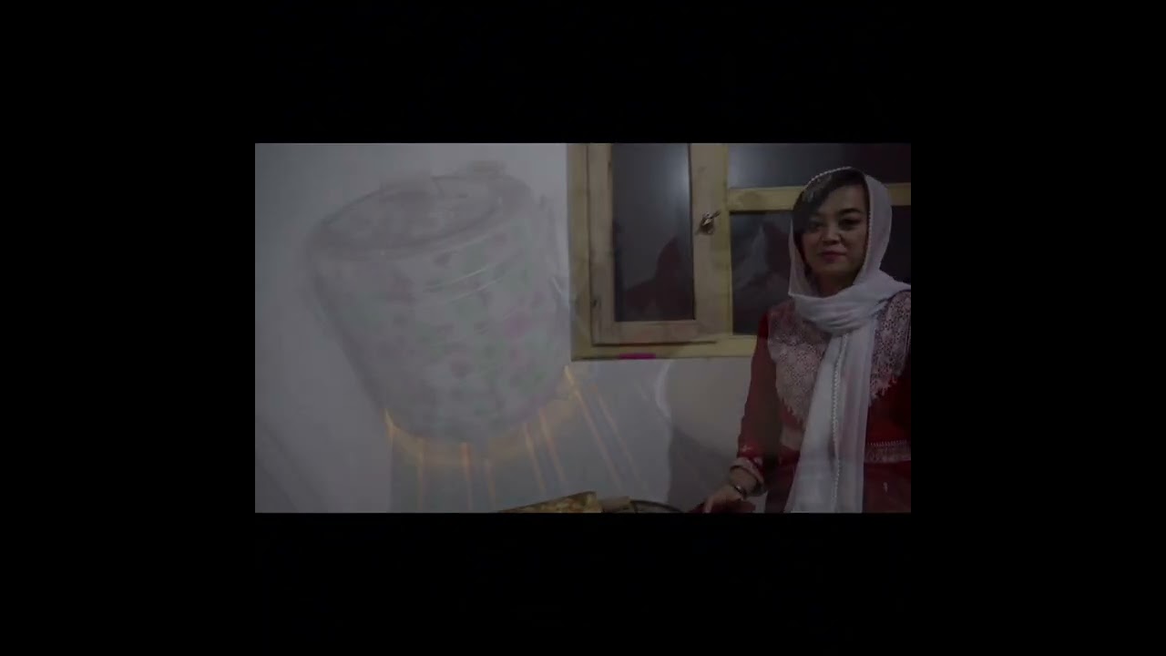 پختن نان در تنور گازی. Baking bread in a gas tandoor