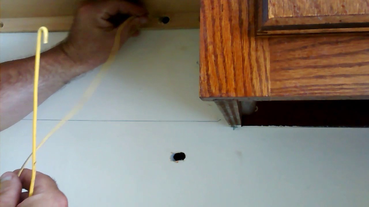 How to fish wires threw the wall coat hanger and string(made hook on