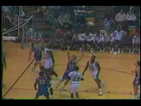 Shaq jumps over the defender's head and dunks (LSU)