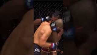 ONE Championship fighters engage in a fast clinch exchange  elbows and knees firing  Camera  tight