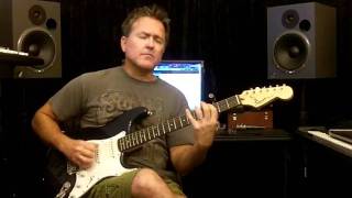 Me playing guitar over Am F C and G