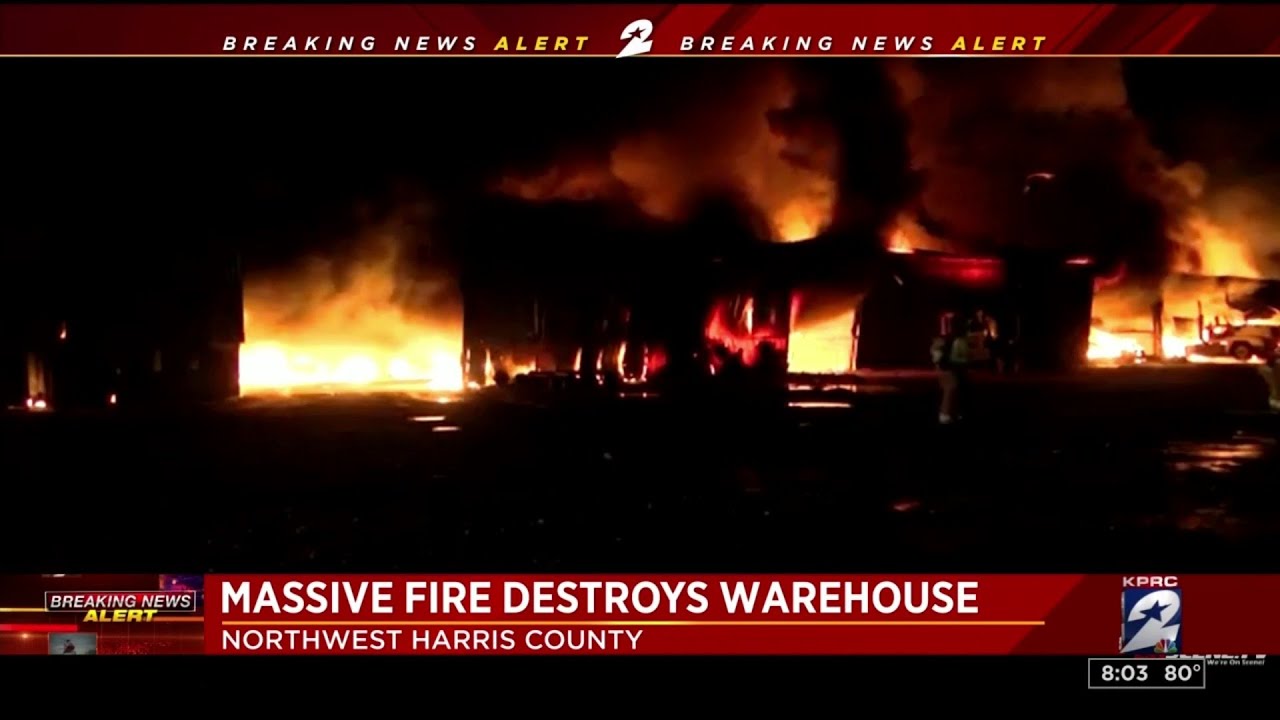 Massive fire destroys warehouse - YouTube