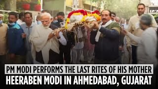 PM Modi performs the last rites of his mother Heeraben Modi in Ahmedabad, Gujarat