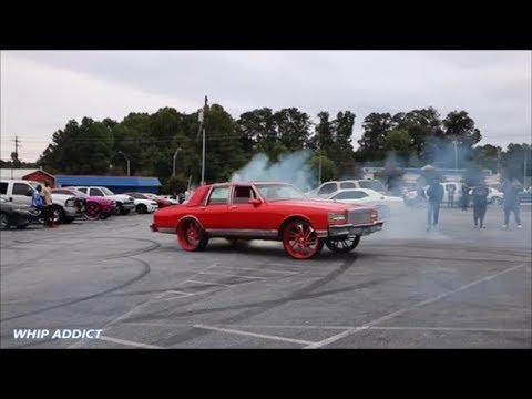 whipaddict:-red-chevrolet-caprice-ls-w/406-on-asanti-26s-doing-dounts-and-burnouts.-atlanta,-ga