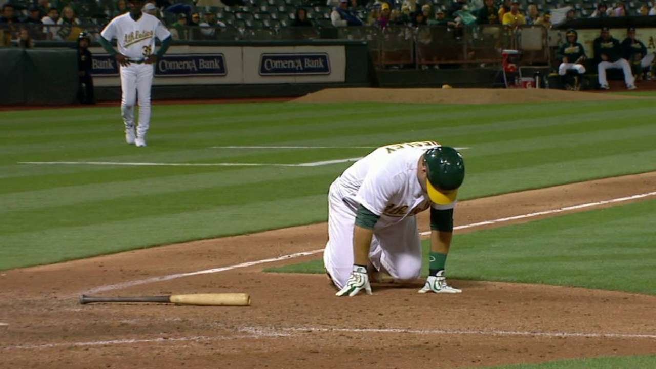 TEX@OAK: Phegley gets hit by a pitch, leaves the game