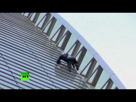 'French Spiderman': Urban climber scales Paris skyscraper without harnesses