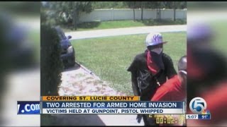 Two arrested for armed home invasion
