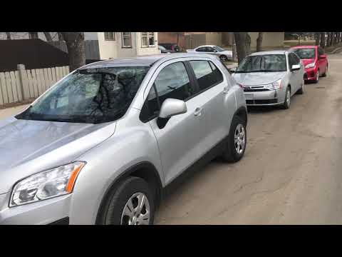 Legal Saskatoon street parking with illegal parking ticket from city parking enforce issuer R054