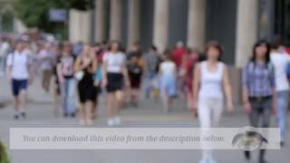 Footage. People walking on the street, not in focus