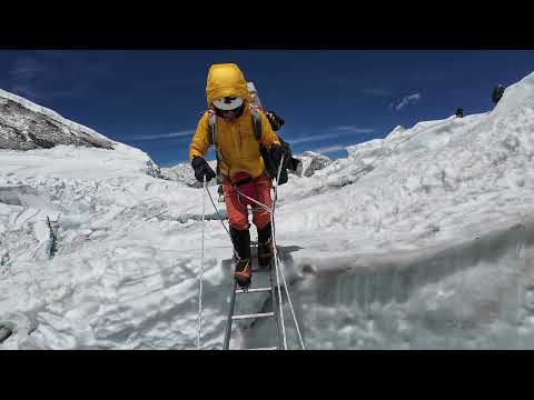 Khumbu ice falls crossing ladders. Mt. Everest.
