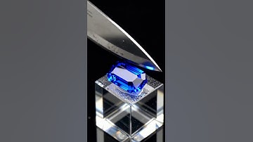 Super-sharp knife cuts real minerals—obsidian, sapphire, emerald—capturing authentic cleavage and re