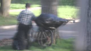 Slavic types refugees come to Utica NY and look for cans and other things on trash night