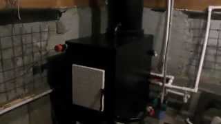 Твердотопливный котел длительного горения(Твердотопливный котел длительного горения с водяной рубашкой вокруг топки и трубы. Заслонка подачи воздух..., 2015-03-13T18:32:08.000Z)
