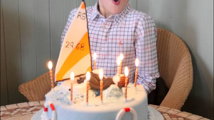 Blowing out the candles on a birthday cake in 4K photography